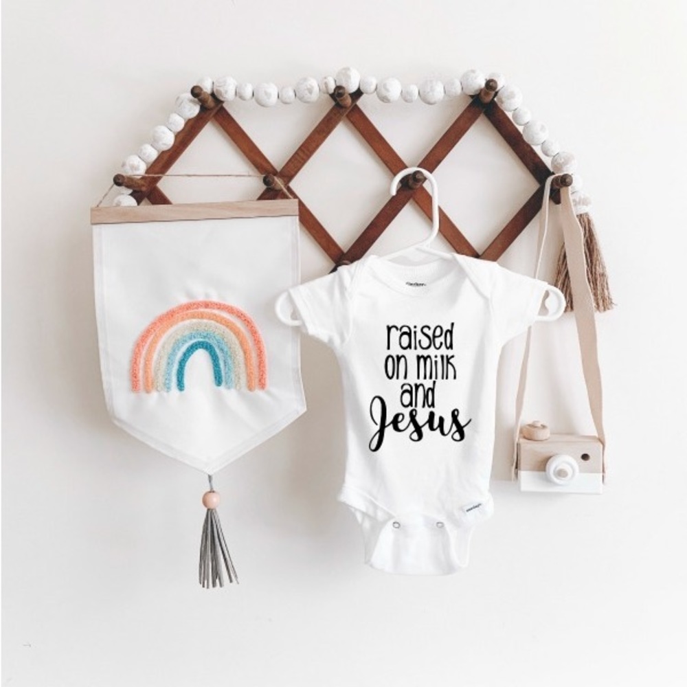 Raised On Milk And Jesus Baby Onesie